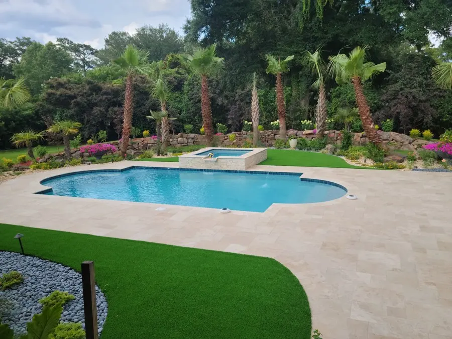 Pool area with turf and landscaped beds