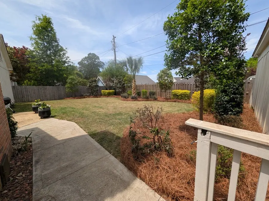 Side yard with new mulch beds